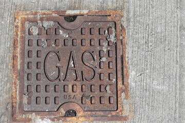 Rusted Gas Valve Cover on New York City Sidewalk