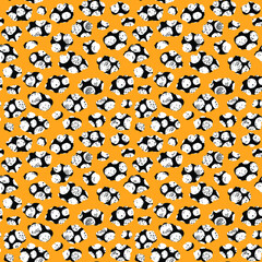 Abstract spotted pattern. Vector seamless pattern on orange background.