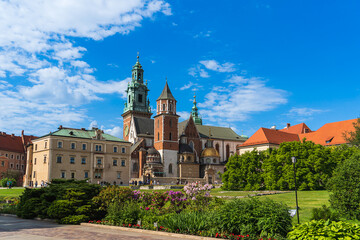 Fototapeta na wymiar Wawel Royal Castle complex in Krakow on a sunny summer day. Wawel Castle is the main historical attraction in Poland. A tourist route.
