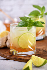   Refreshment organic non-alcohol cocktail. Honey ginger lemonade with a touch of basil flavor