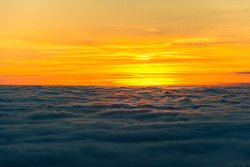 sunset over the clouds