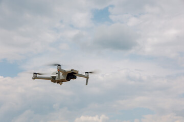 Fototapeta na wymiar drone copter flying with digital camera in sky