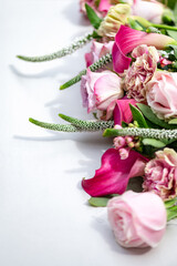Hand tied exquisite bouquet features antiqua carnations, elegant Calla Lilies, Roses and fragrant Eucalyptus.