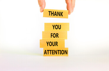 Thank you for attention symbol. Concept words Thank you for your attention on wooden blocks on beautiful white table white background. Businessman hand. Business and thank you for attention concept.