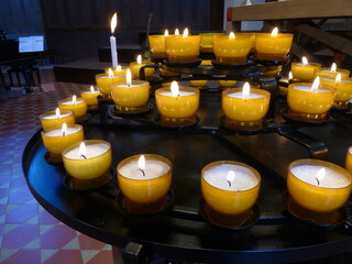 burning candles in church