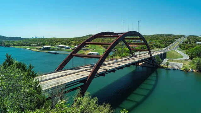 Timelapse of Pennybacker Bridge - 360 Bridge - in Austin Texas on a sunny spring day