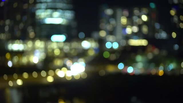 Abstract city night lights illuminated blurred urban background