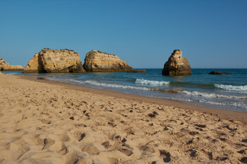 Fototapeta na wymiar Beautiful view of the Praia dos Tres Castelos in Portimao, Algarve, Portugal