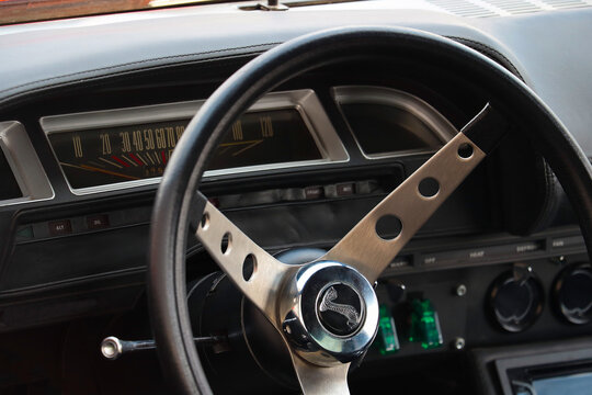 Wroclaw, Poland, August 25, 2021: steering wheel and interior of an old sports car.