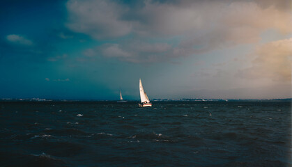 sailboat on the sea, Tagus River Lisbon Portugal