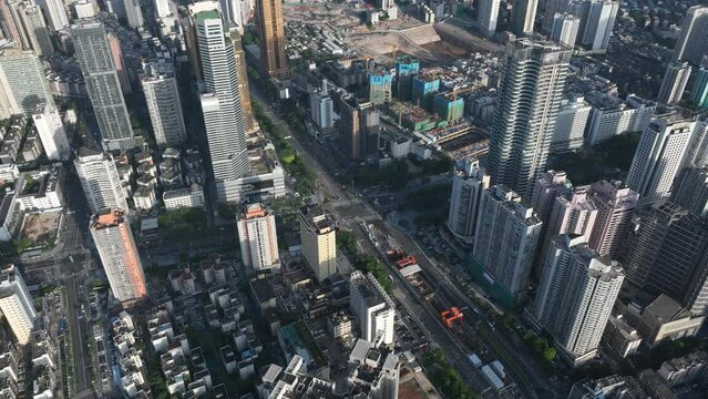 Shenzhen ,China - Circa 2022: Aerial footage of landscape and traffic jam during morning rush hour in downtown of shenzhen city, China,Hyperlapse