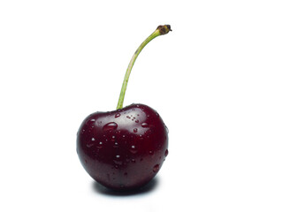 Juicy cherries in water droplets on a white background. Useful food. Beautiful berries isolate. Ripe berries on the table. Ingredient for a dish.
