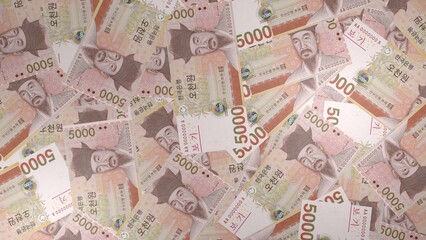 5000 South Korean won bills background. Many banknotes. Finance. KRW. Business concept. 