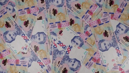 200 Ukrainian hryvnia bills background. Many banknotes. Finance. Jackpot, lottery. 