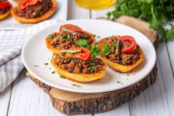Traditional Turkish food; baked potato dish with minced meat, Turkish name; Patates karniyarik