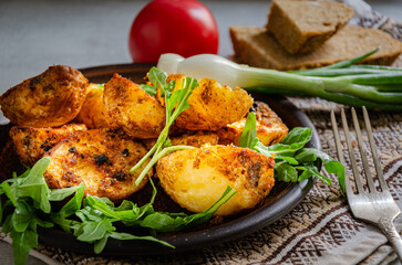 Homemade baked potatoes cooked in the 