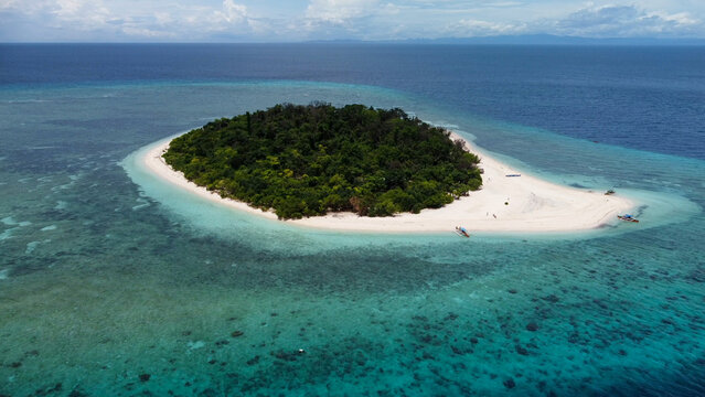 Aerial drone view of a beautiful tropical island, Mantigue Island