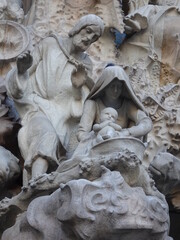 Fototapeta premium [Spain] The sculpture at The Door of the Charity of Nativity Facade, Sagrada Familia Cathedral (Barcelona)