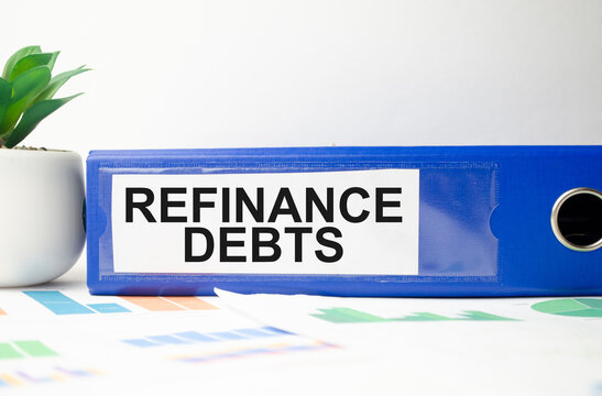 Refinance Debts Text Written On Folder With Documents