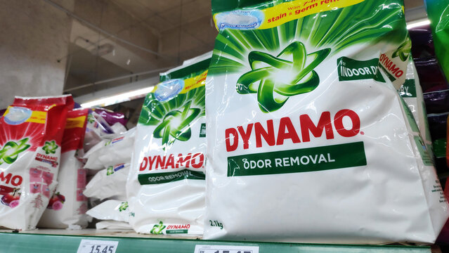 Dynamo Laundry Powder Detergent stacked on shelves