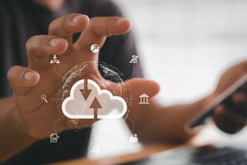 Big data analytics and business intelligence (BI) concept on a digital screen interface and a businessman working with a smartphone and computer laptop in the background.