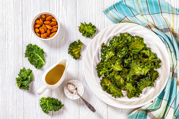 white plate with kale chips on the table