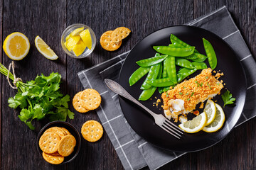 Baked Haddock with Crackers toppings and snow peas