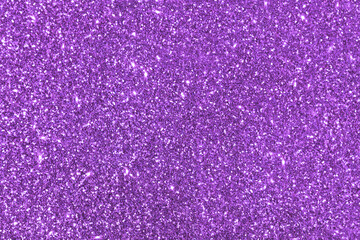 Purple violet glittery texture background. New Year, Christmas and all celebrations concept.