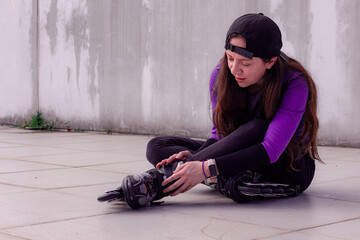 young sporty woman practicing inline skating in an urban setting