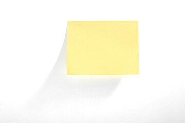 Blank yellow notepad on white