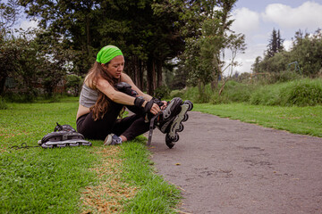 young sporty woman practicing inline skating in an urban setting. High quality photo