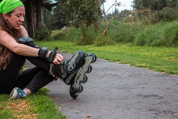 young sporty woman practicing inline skating in an urban setting. High quality photo