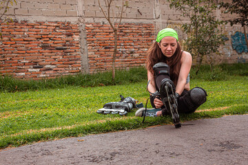 young sporty woman practicing inline skating in an urban setting. High quality photo