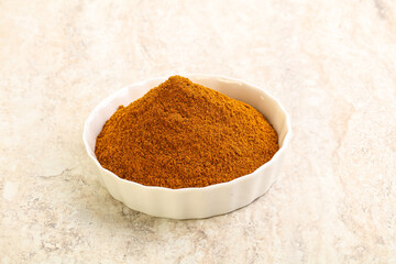 Dry Paprika powder in the bowl