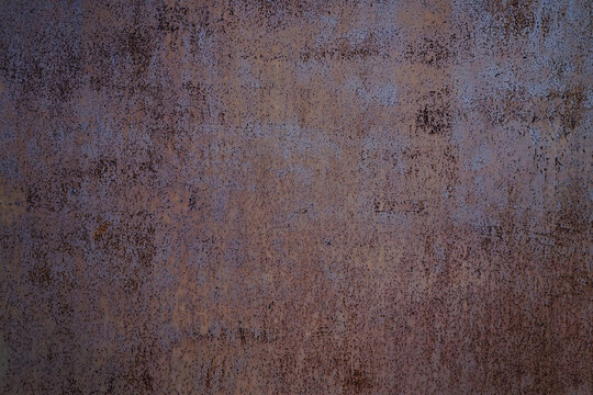 Dark blue brown grunge texture. Old rusty painted metal surface. Rust background with space for design. © Наталья Босяк