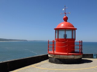 Fototapeta na wymiar Lighthouse in Nazare, Centro - Portugal 