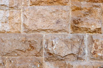 Fototapeta premium Brown stone wall texture background