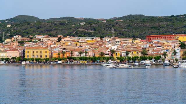 Carloforte. Sardegna. Wonderful cityscape of the town from the boat that is approaching the island. Carloforte is the main city of the San Pietro island