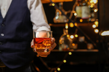 Bartender pouring Whiskey, on  bar,
