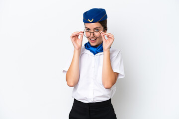 Airplane stewardess caucasian woman isolated on white background with glasses and surprised