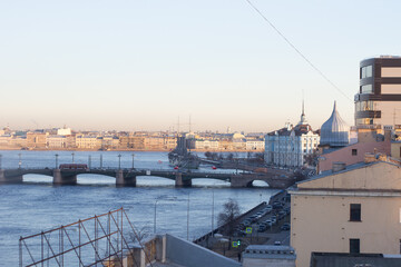 city bridge on the river landscape with an old battleship