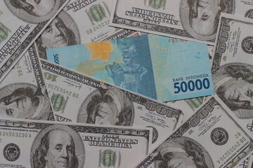 Fototapeta na wymiar Conceptual Photo 50000 Rupiah Beyond dollar paper money, Flat Lay