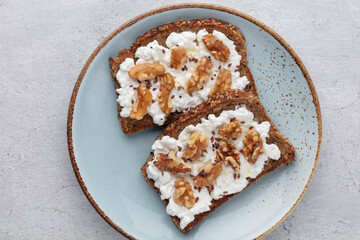 Sandwich with philadelphia and walnuts. Healthy nutritious paleo keto breakfast concept.
