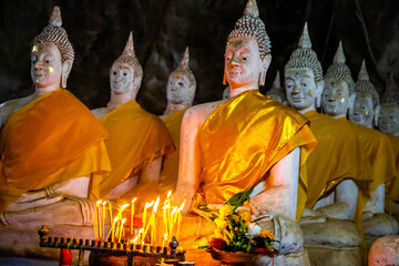 Wat Ao Noi buddha statues in the cave in Prachuap Khiri Khan, Thailand