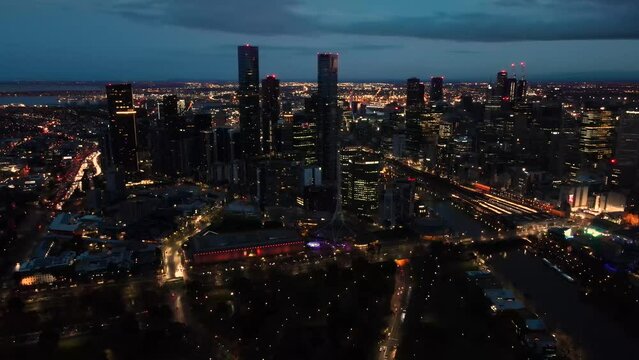 Beautiful aerial drone view of Melbourne City, Victoria, Australia looking over Yarra River in the very early morning before dawn 