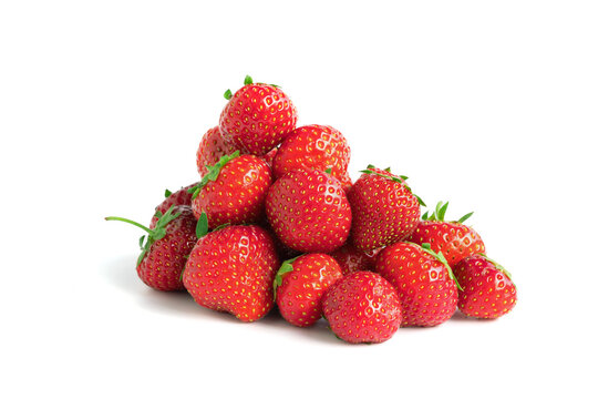 Group of strawberrys (Genus fragaria) isolated on white.