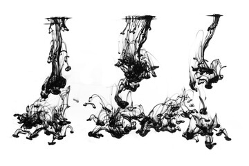 Black ink dropped into water on white background.