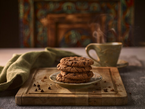 Chocolate Chip Cookie On Wood Tray With Tea.