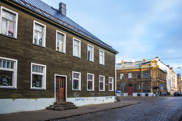 Old wooden houses, well preserved, next to Alberta Street in Riga, Latvia