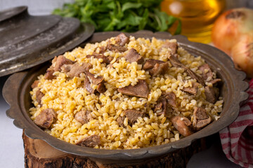 From traditional delicious Turkish cuisine; Bulgur pilaf with meat (Turkish name; etli bulgur pilavi)